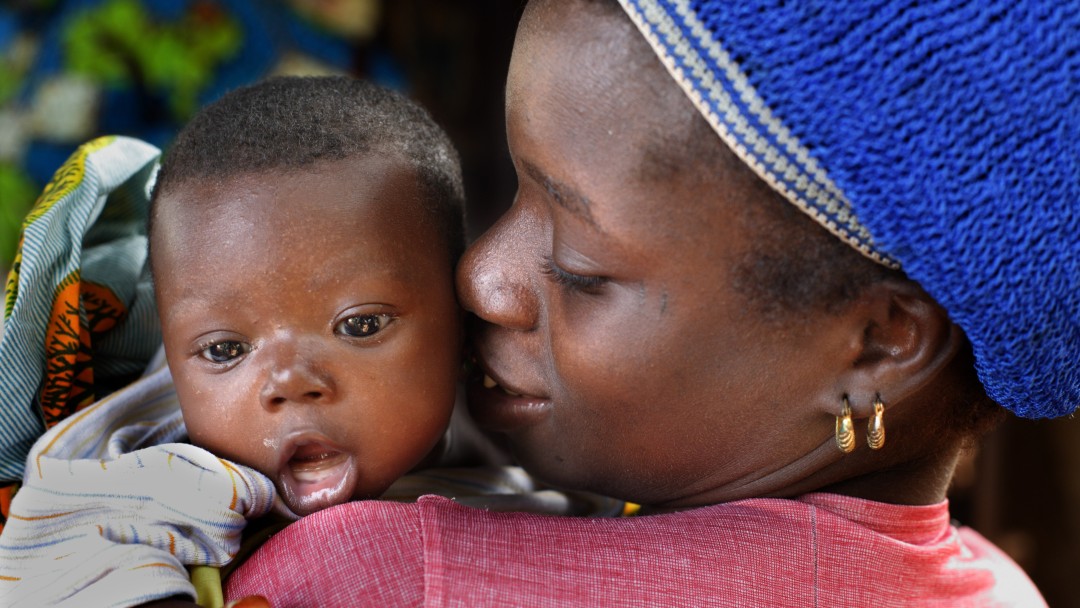 A young mother in Mali with her baby.