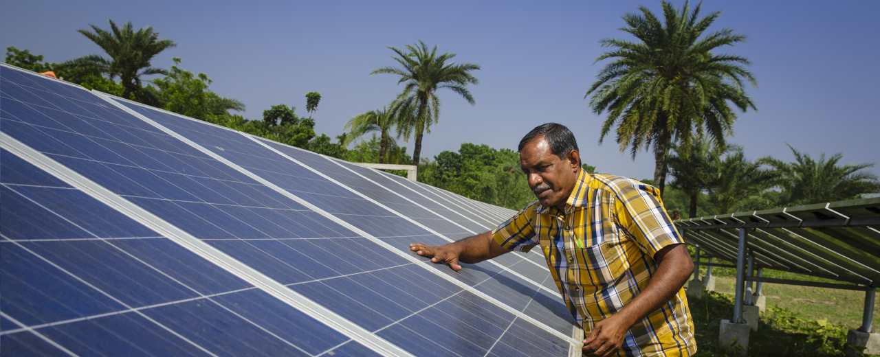 Man sets up a solar panel