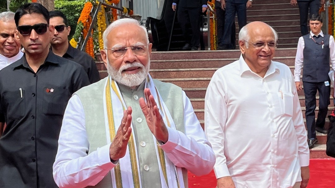 Indian Prime Minister Modi in front of a railway station